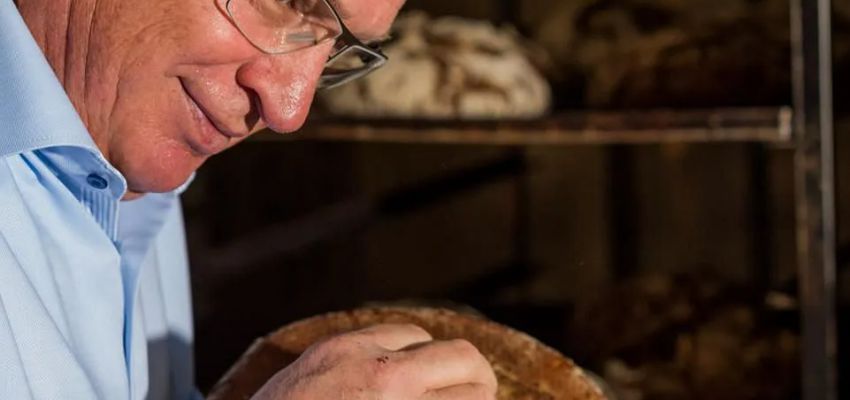 Thomas Walch checks the freshly baked bread